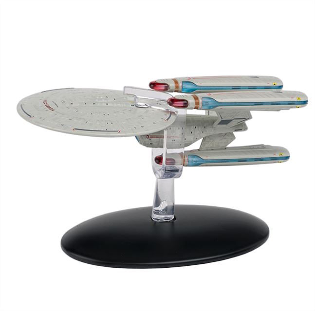 Model of a spaceship on a black base with a white background
